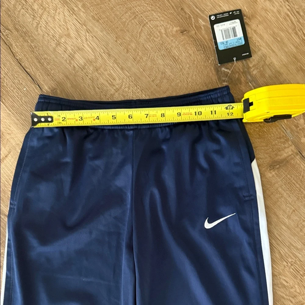 Nike Kids Navy Track Pants with White Side Stripes, Size Medium